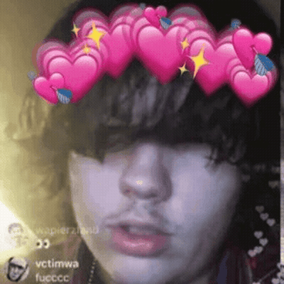Close Up Face With Crown Of Pink Hearts GIF
