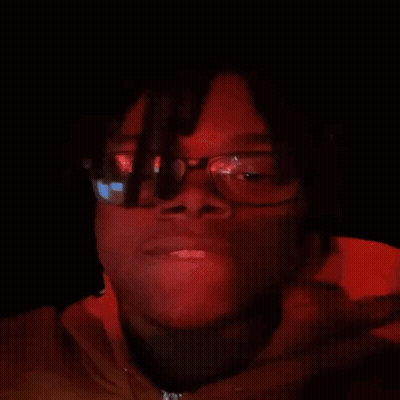 Close Up Face With Glasses And Dreadlocks GIF