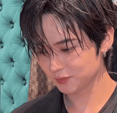 Close Up Face With Gucci Pattern On Couch GIF