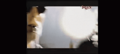 Close Up Face With Light Coming Out GIF