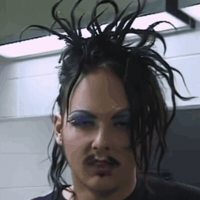 Close Up Face With Mustache And Purple Eye Shadow GIF
