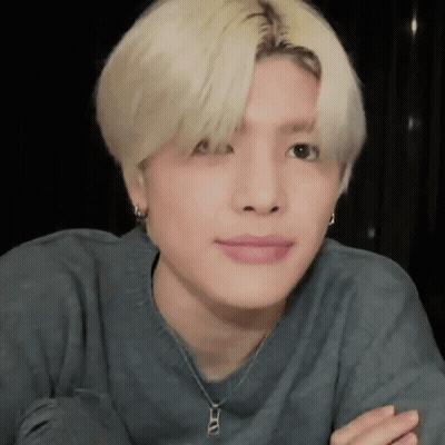 Close Up Face With Necklace And Earrings GIF