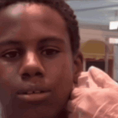 Close Up Face With Pink Glove GIF