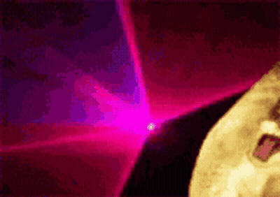 Close Up Face With Pink Light GIF