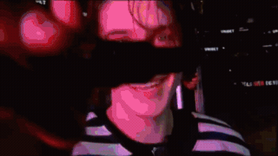 Close Up Face With Purple Background GIF