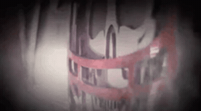 Close Up Face With Red And White Ribbon GIF