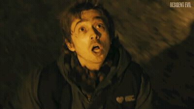 Close Up Face With Resident Evil Text GIF