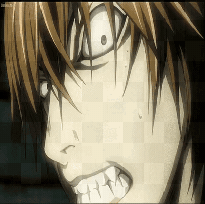 Close-Up Face With White Eyes And Teeth GIF