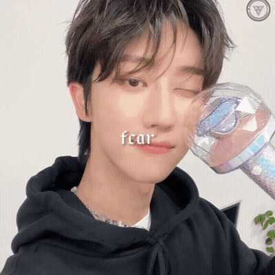 Close Up Face With Word Fear GIF