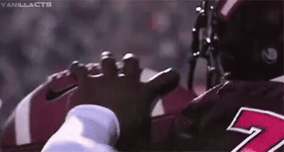 Close Up Football Helmet Number 7 GIF
