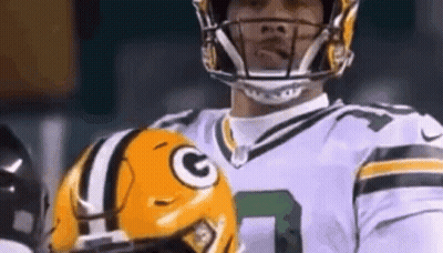 Close Up Football Player Holding Helmet GIF