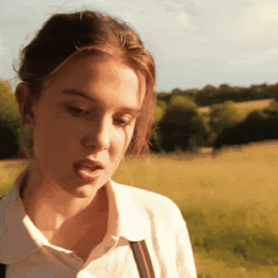 Close Up Girl In White Shirt And Vest GIF