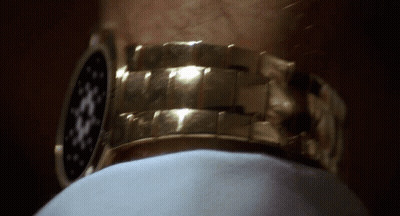 Close Up Gold Watch On Man's Arm GIF