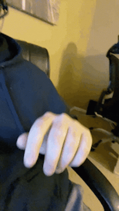 Close-Up Hand in Black Shirt
