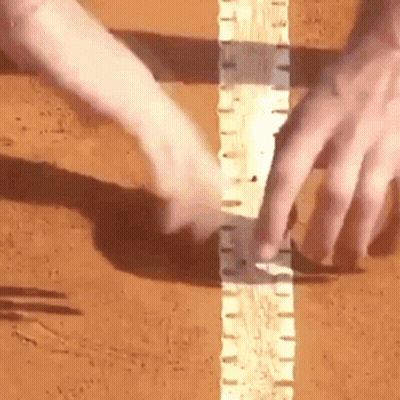 Close Up Hands Holding Piece Of Wood GIF