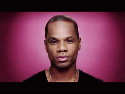 Close Up Man Face Against Pink Background GIF