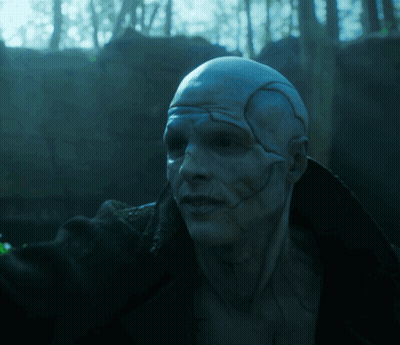 Close Up Man Face In Dark Forest GIF