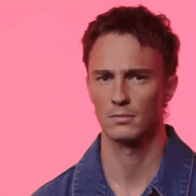 Close Up Man Face Pink Background GIF