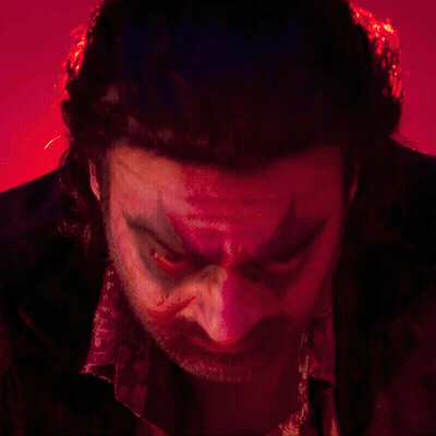 Close-Up Man Face Red Background GIF