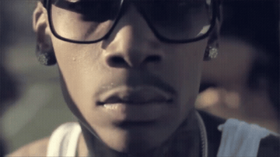 Close Up Man Face Wearing Sunglasses And Earrings GIF