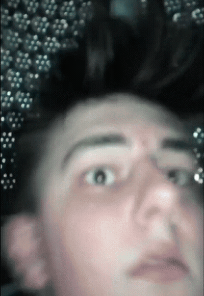 Close Up Man Face With Blurred Bubbles GIF