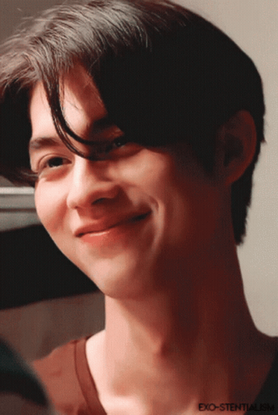 Close Up Man Face With Exo-Stentalism Written On Chest GIF