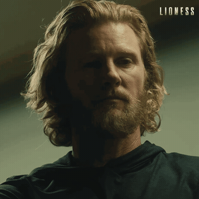 Close Up Man Face With Lioness Background GIF