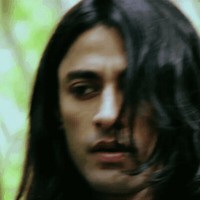 Close Up Man Face With Long Hair GIF
