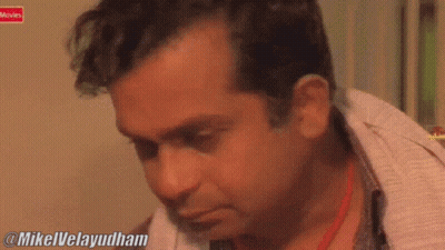 Close Up Man Face With @Mikelvelayudham Watermark GIF