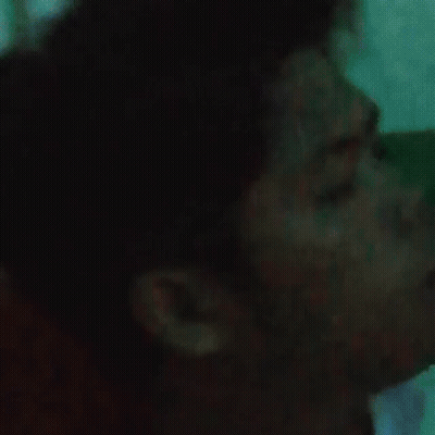 Close Up Man Face With Pink Light GIF