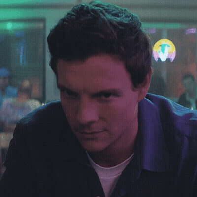 Close Up Man Face With Sign Saying T GIF