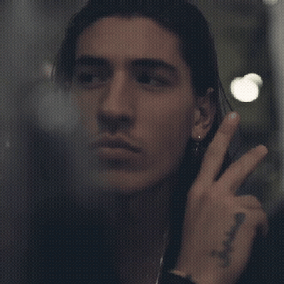Close Up Man Face With Tattoo Saying A GIF