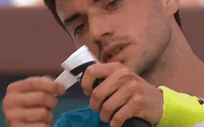Close Up Man Holding Tennis Racquet GIF
