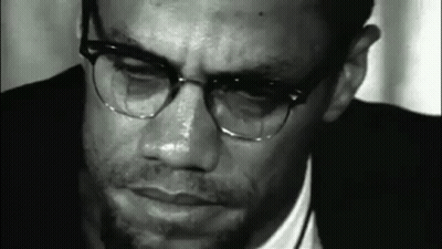 Close Up Man In Glasses And Suit Black And White GIF