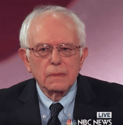 Close Up Man In Glasses And Suit With Live NBC News Text GIF