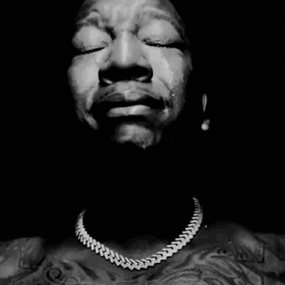 Close Up Man Praying With Folded Hands GIF