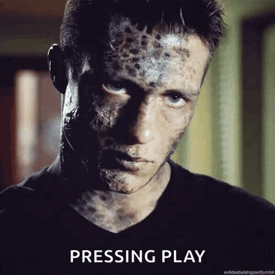 Close Up Man Pressing Play GIF