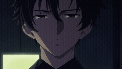 Close Up Man's Face In Dark Room With Yellow Light GIF