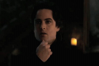 Close-Up Man's Face In Dark GIF