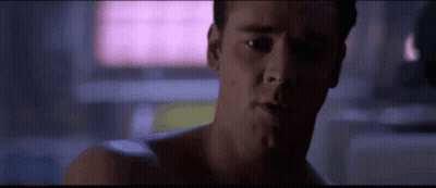 Close Up Man's Face Pink Background GIF