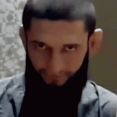 Close Up Man's Face With Black Beard GIF