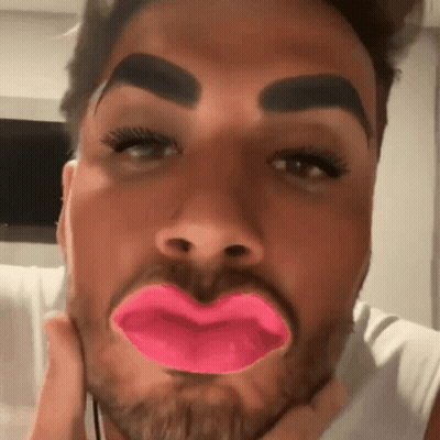 Close Up Man's Face With Pink Lips And Beard GIF