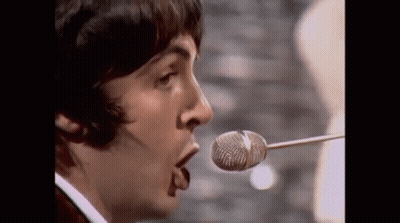 Close Up Man Singing Into Microphone GIF