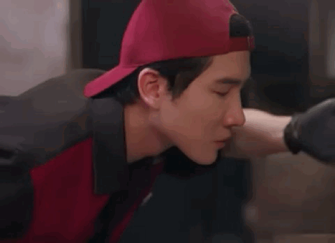 Close Up Man Wearing Red Hat And Red Jacket GIF