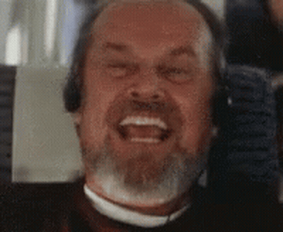 Close Up Man With Beard And Headphones On Plane GIF