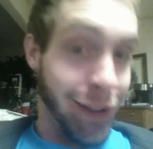 Close Up Man With Beard Wearing Blue Shirt GIF