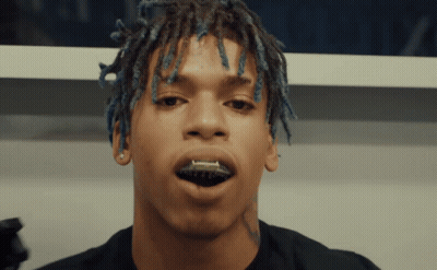 Close Up Man With Blue Dreadlocks GIF