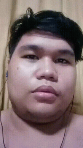 Close Up Man With Ear Buds GIF