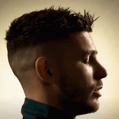 Close Up Man With Eyes Closed And Ear Tattoo GIF
