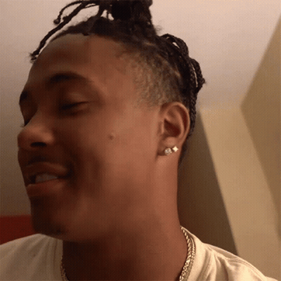 Close Up Man With Eyes Closed And Earrings GIF